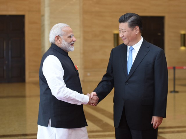 Главы Индии и Китая договорились решать разногласия