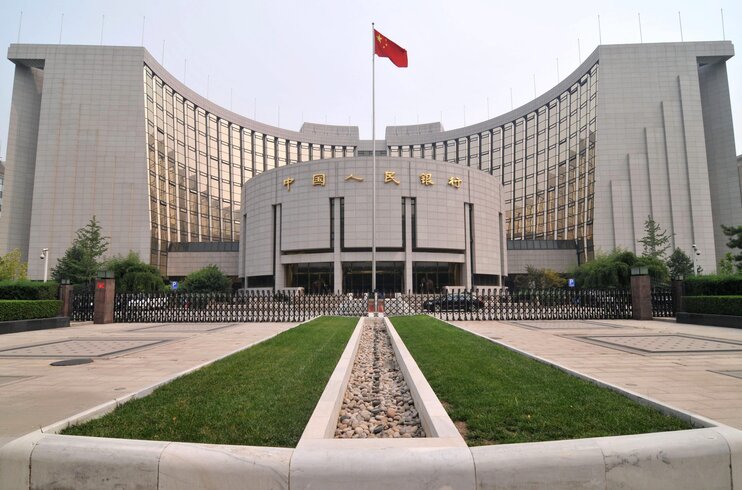 ЦБ Китая обещает снизить расходы на финансирование, предотвращая долговые и инфляционные риски